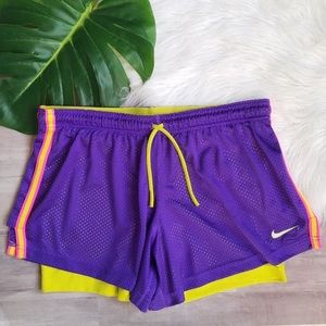 Nike Women’s Purple Mesh Athletic Shorts with Yellow Trim